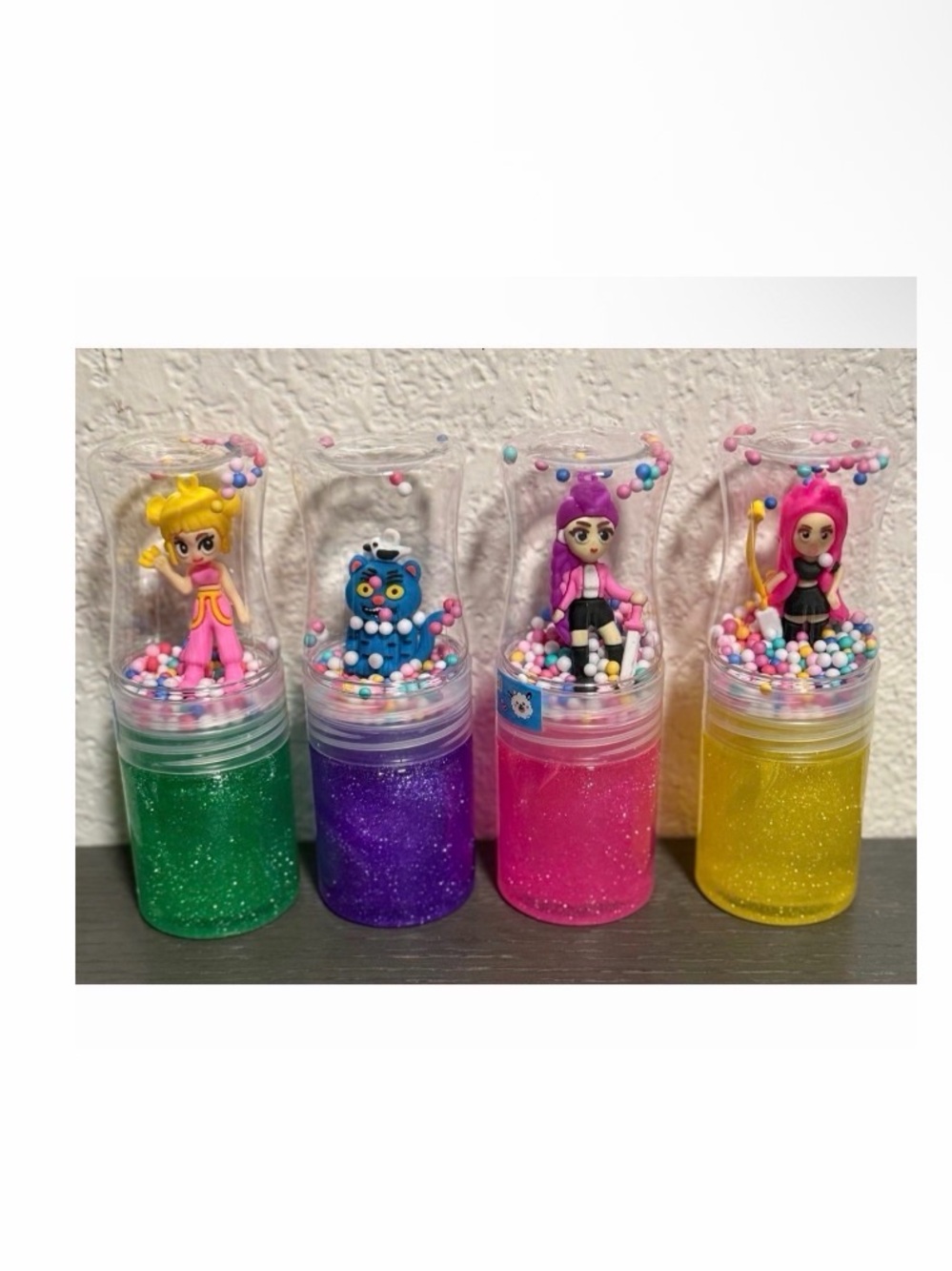 Assorted Glitter Slime Jars with Mini Figurines - Green, Purple, Pink, Yellow
